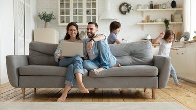 Parents Sitting on the Sofa While Kids are Playing — Locust, NC — Barbee Insurance Agency Parents Sitting on the Sofa While Kids are Playing — Locust, NC — Barbee Insurance Agency