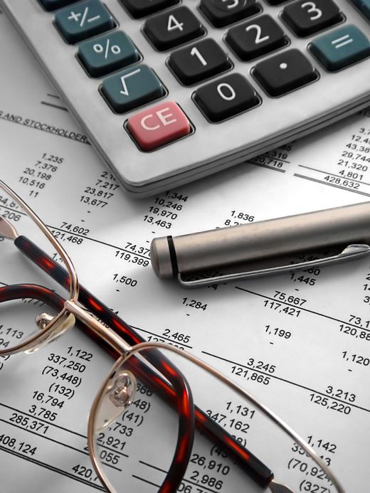 Auditor is working on desc office using reading-glass, Statutory audit