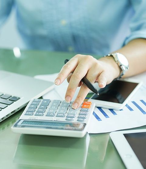 calculator and coins