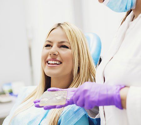 General Dentist — Woman in Dentist Office in Tenafly, NJ General Dentist — Woman in Dentist Office in Tenafly, NJ