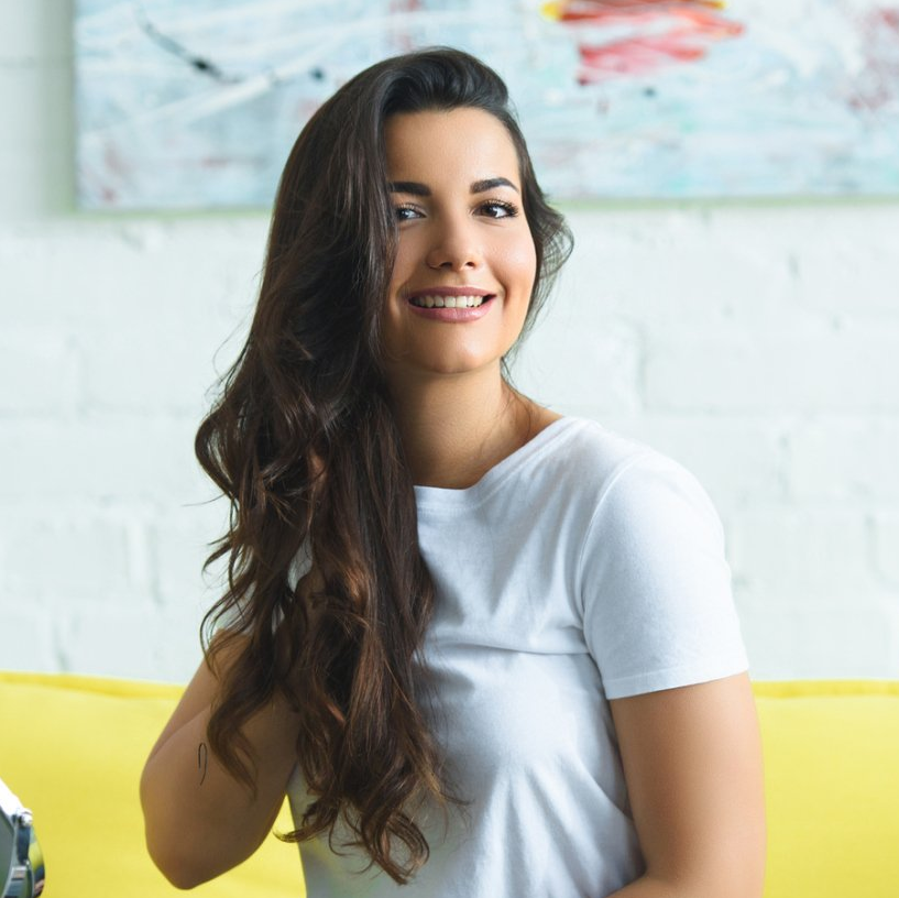 woman with long hair smiling