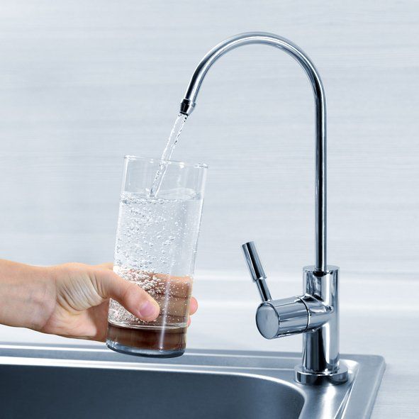 kitchen sink with water rurnning