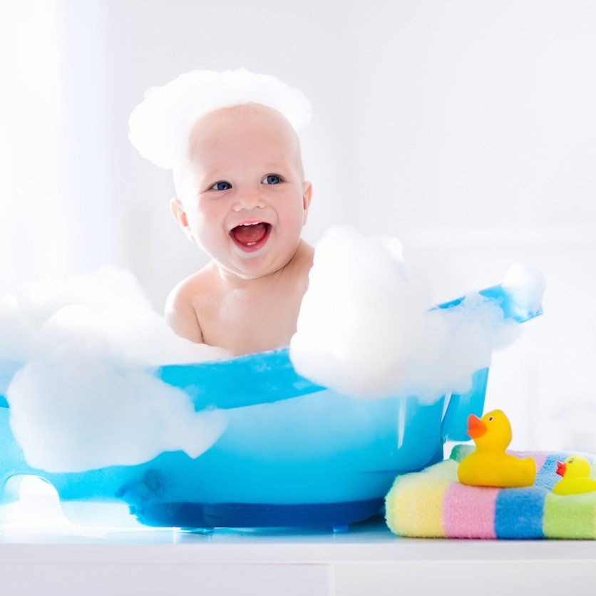 Little baby taking a bath
