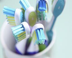 Set of Blue and Green Toothbrush — Dental Care in Denver, CO Set of Blue and Green Toothbrush — Dental Care in Denver, CO