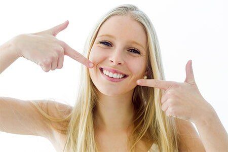 Beautiful Young Woman With Perfect Smile — Dental Care in Denver, CO