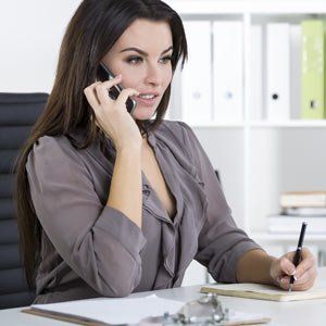 Woman Ready to Contact Solution Web Designs for a Free Consultation Regarding Your Law Firm Website. A Partner with Over 25 Years of Legal Marketing Experience