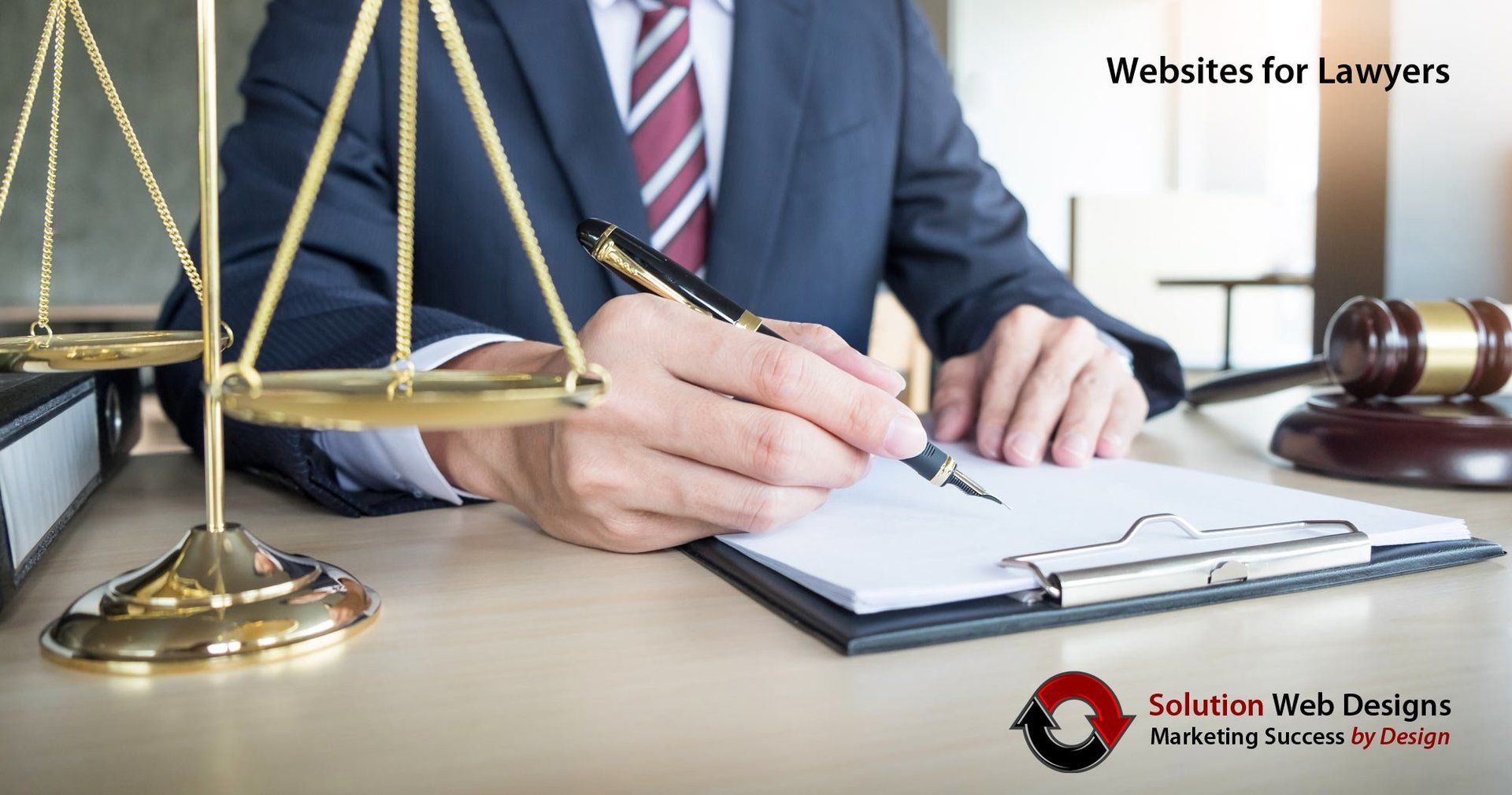 A lawyer writing on a notepad in his law firm's office. Websites for Lawyers - Law Firm Marketing Agency - Solution Web Designs