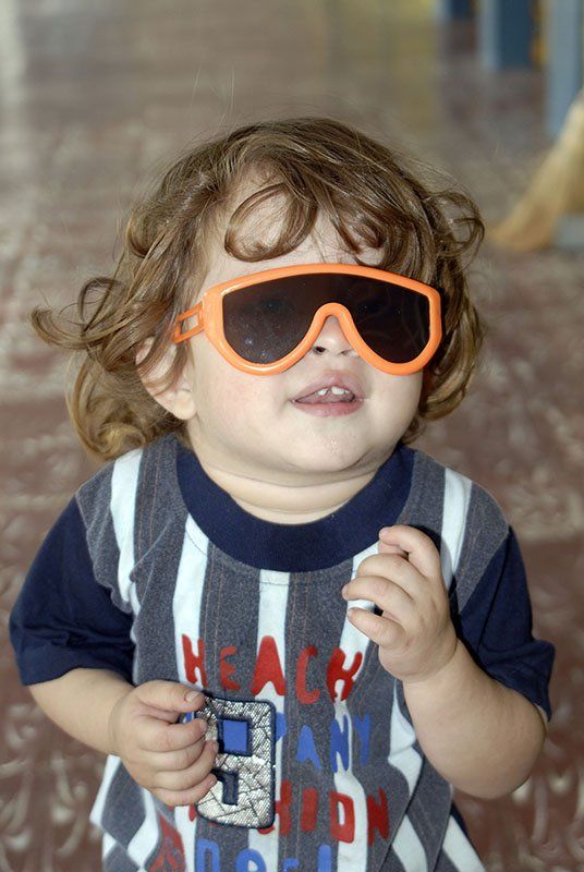 boy with orange glasses