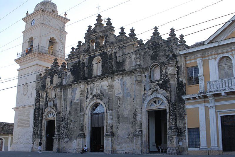 A large building with a clock tower on top of it in Nicaragua
