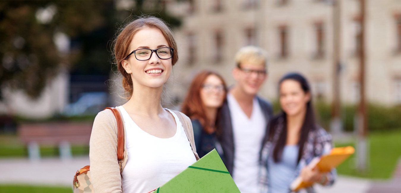 Young female student with glasses