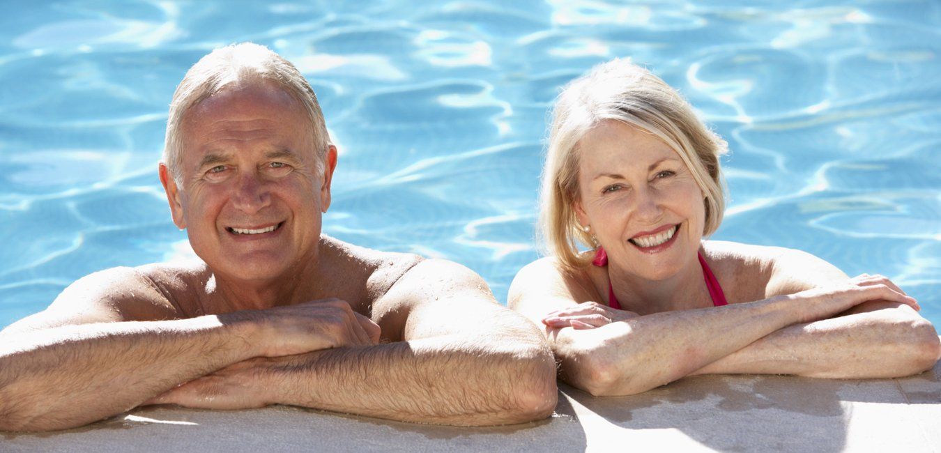 Senior adults poolside