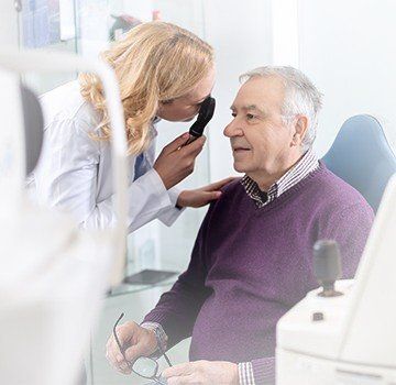 Senior adult getting eye exam