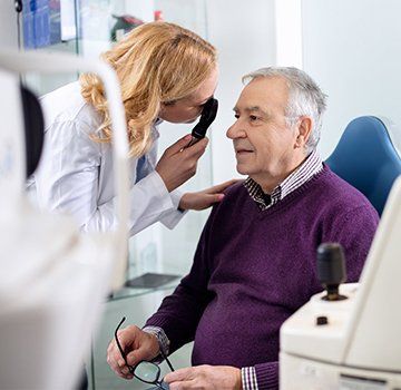 Older man getting eye exam