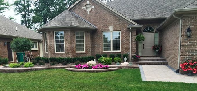 Beautiful Landscaping With Different Color of Plants And Flowers — Landscaping in Shelby Township, MI Beautiful Landscaping With Different Color of Plants And Flowers — Landscaping in Shelby Township, MI