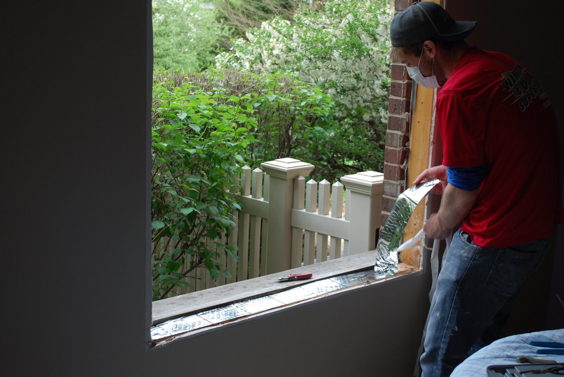 Man Installing New Door — Oak Forest, IL — Window & Door Super Store