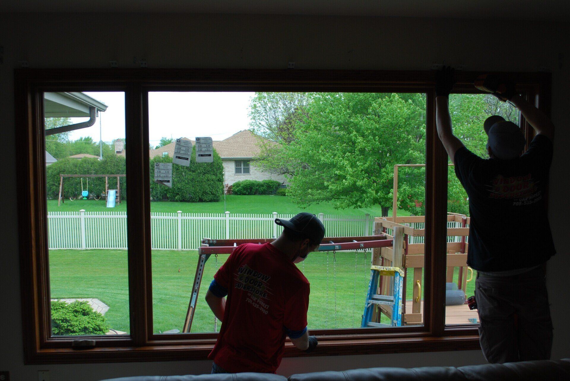 Man Fixing Window — Oak Forest, IL — Window & Door Super Store