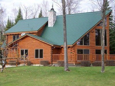 Home with rustic shingle roofing