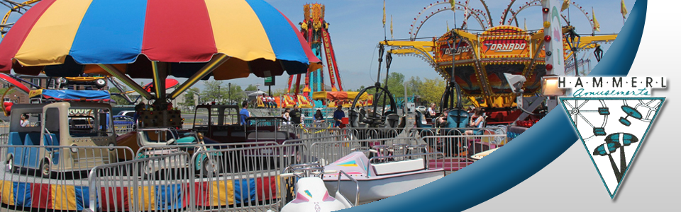 A picture of a carnival with a logo that says u.s. wheels