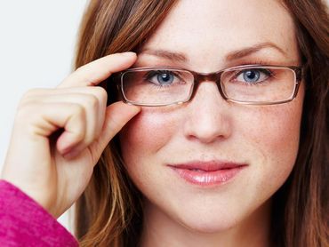 Home — Woman Smiling With Wearing Eye Glasses in Eureka, CA Home — Woman Smiling With Wearing Eye Glasses in Eureka, CA