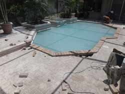 Installing Pavement Around the Pool — Sarasota, FL — Custom Pavers of Southwest Florida