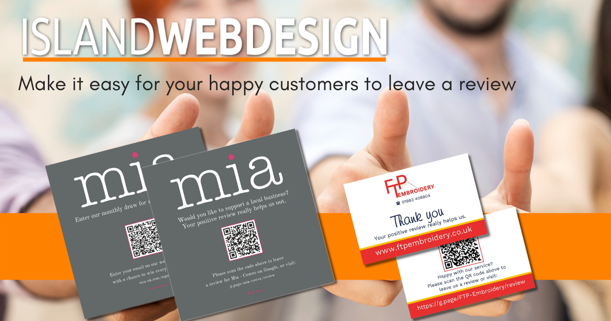a person is holding two business cards in their hands