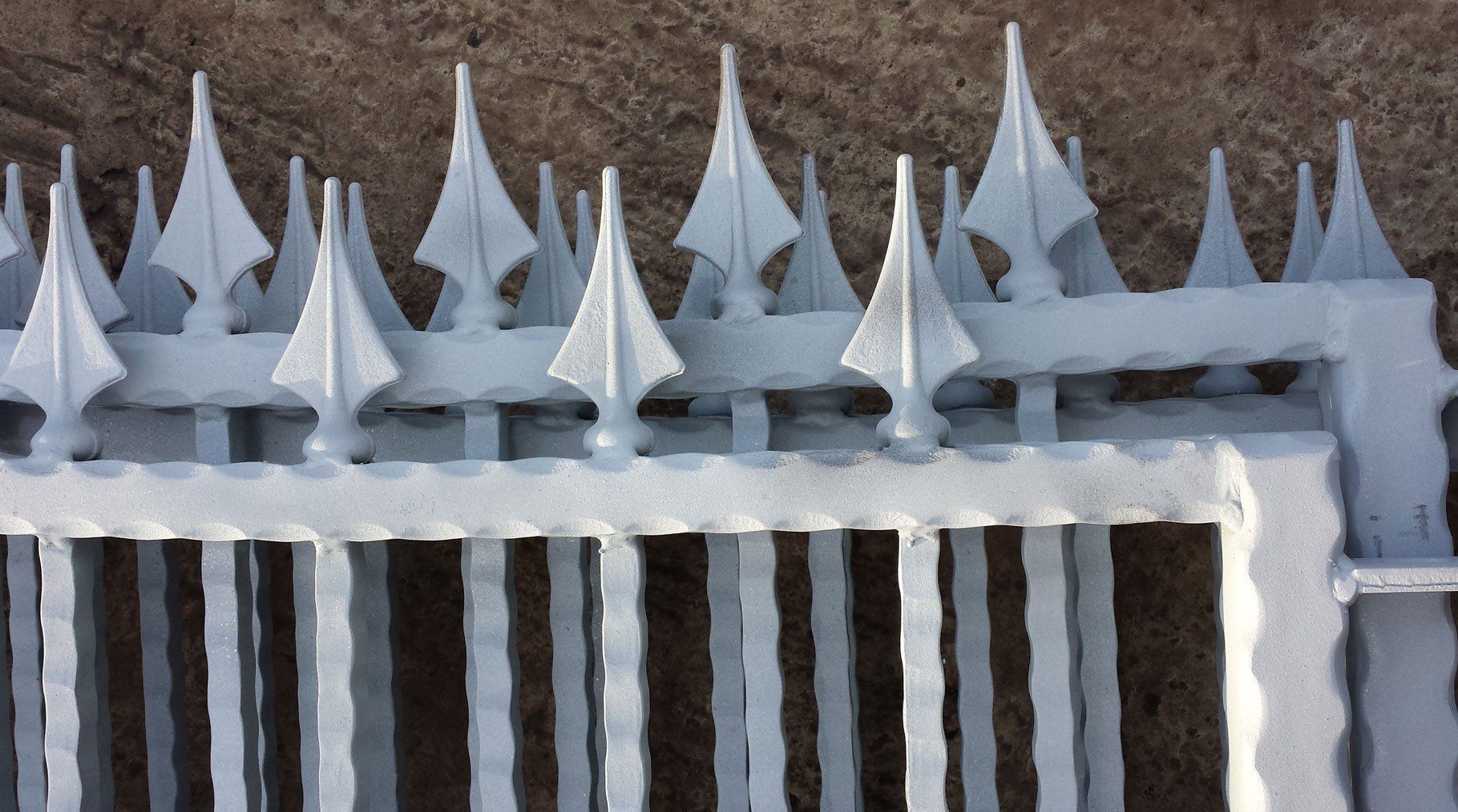 Close-up of zinc metal spraying on railings