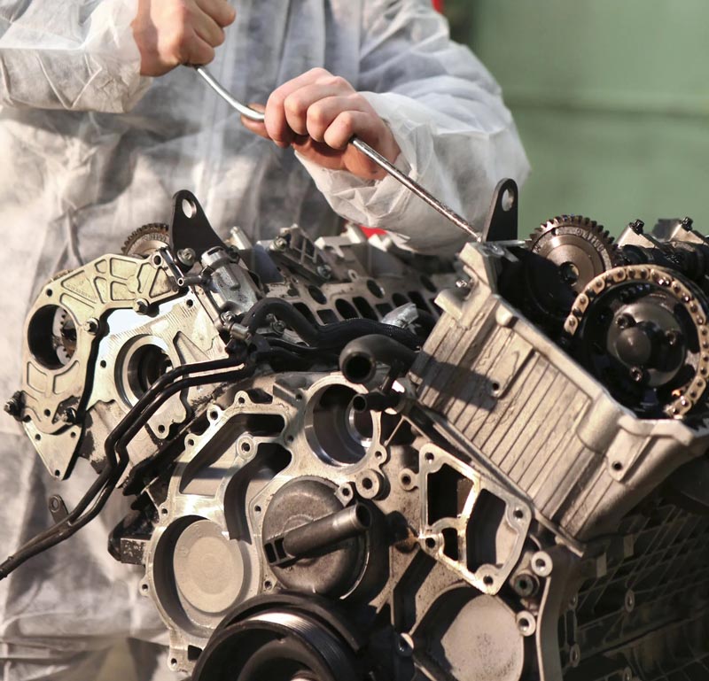 Mechanic Repairing Engine — Automotive Repair in Townsville Mechanic Repairing Engine — Automotive Repair in Townsville