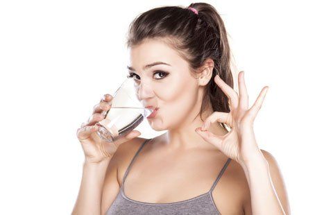 Woman Drinking Water - Water filtration in Central NY