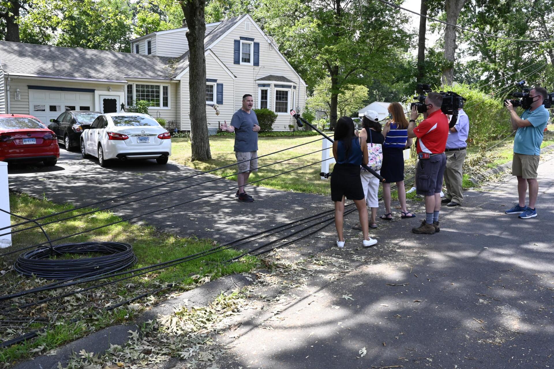 Tropical storm Isaias resident trapped in driveway due to fallen power lines
