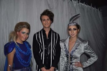 group of people with fancy hair