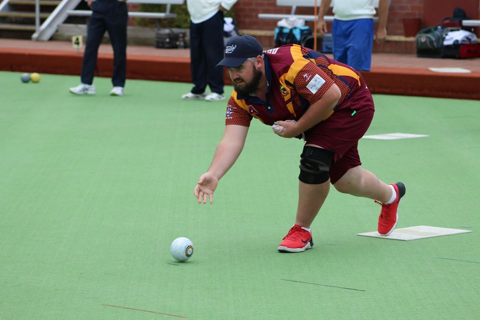 Man delivering a bowl on the green