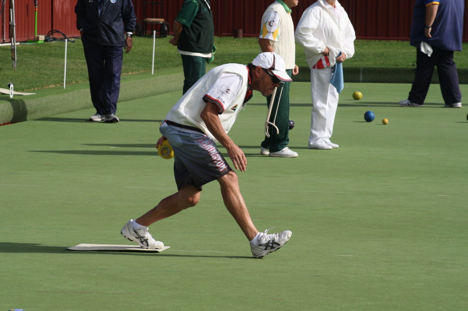 Bowler in action on the green