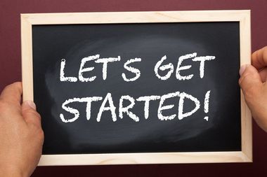 writing in chalk that says let's get started image