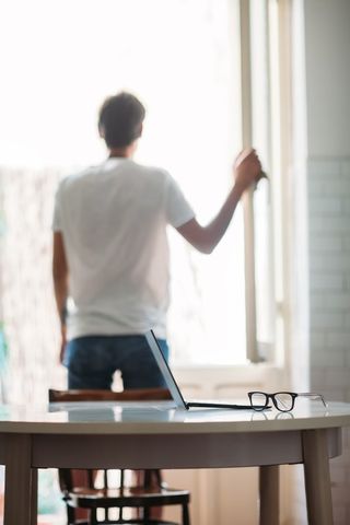 Substance Abuse — Man Standing Near The Window in Richmond, VA