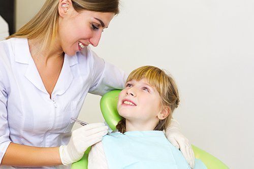 Little kid taken care of during the treatment