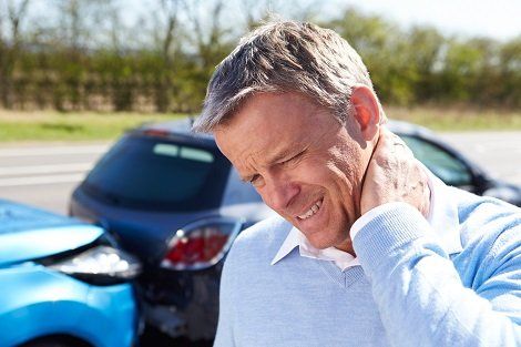 Vehicle Injury — Man Suffering From Whiplash After Traffic Collision in Concord, CA