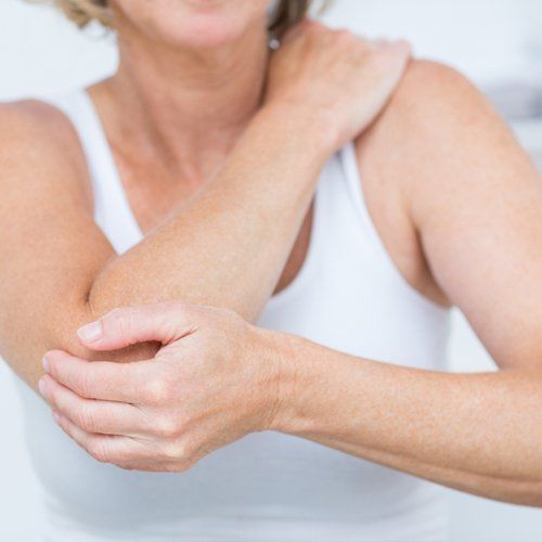 Pain In Joint — Woman Having Elbow Pain in Concord, CA Pain In Joint — Woman Having Elbow Pain in Concord, CA