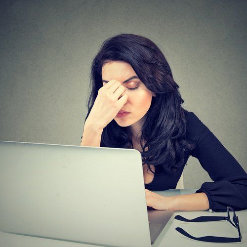 Migraine — Tired Businesswoman Having Migraine in Concord, CA Migraine — Tired Businesswoman Having Migraine in Concord, CA