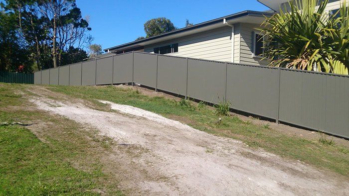 raked colorbond fence