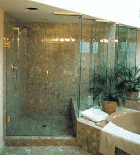 Tiled shower with glass door