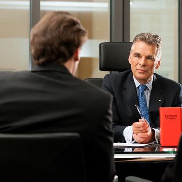 Lawyer with client
