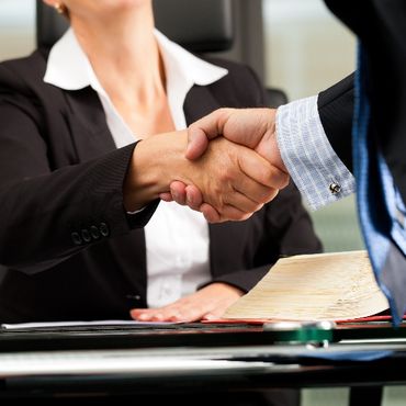 lawyer and client shaking hands