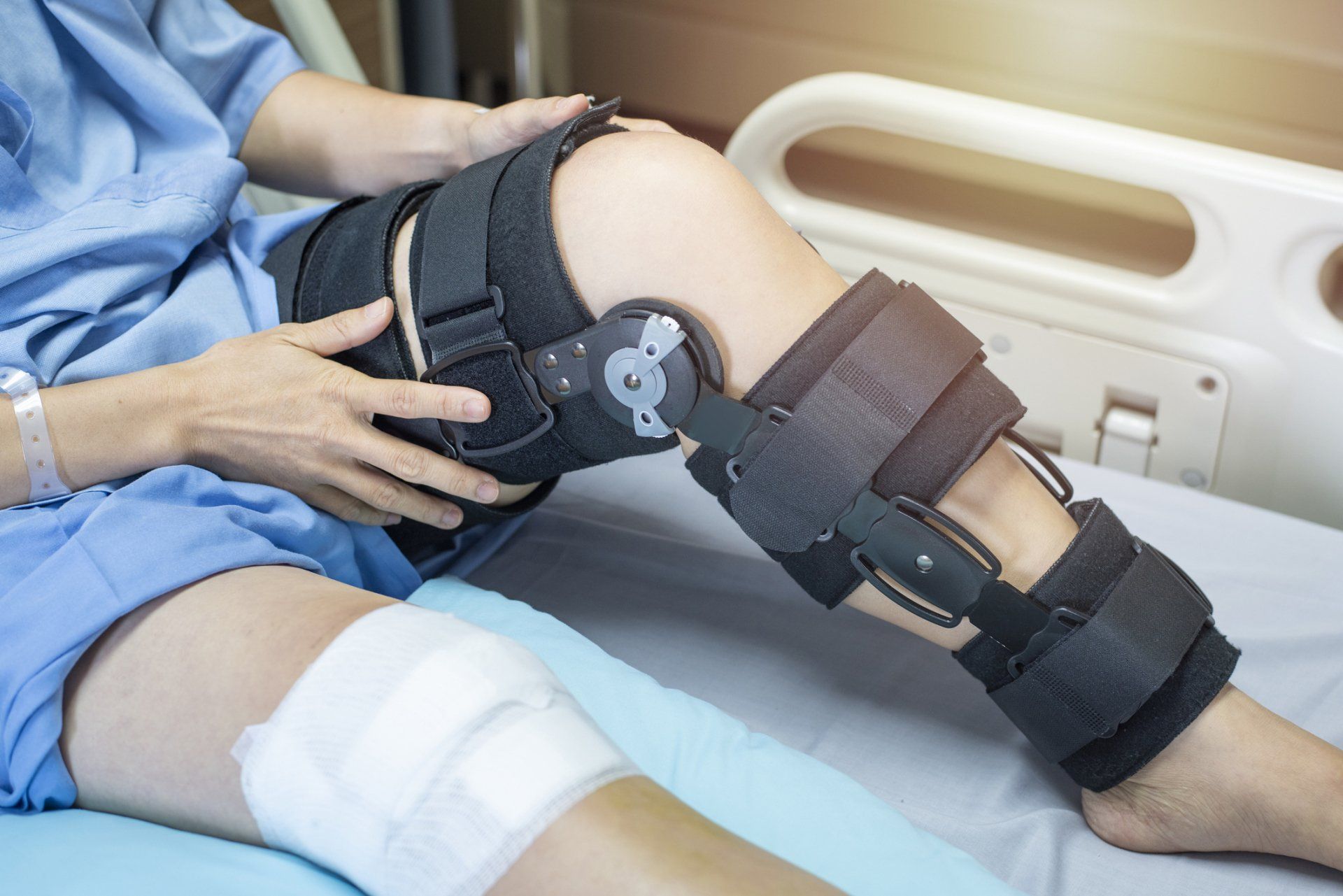 Physical Therapy — Applying Posture Control Shoulder Brace on Male Patient in Dodge City, KS