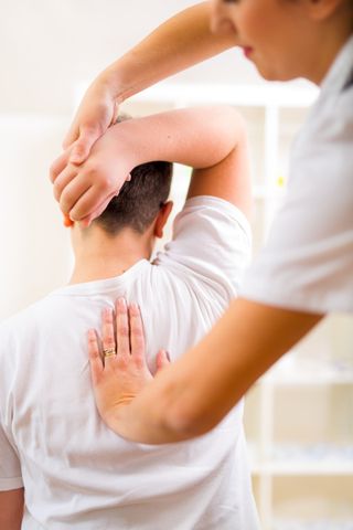 Durable Medical Equipment — Chiropractor Doing Adjustment on Patient in Dodge City, KS Durable Medical Equipment — Chiropractor Doing Adjustment on Patient in Dodge City, KS