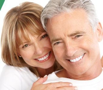 elderly couple smiling