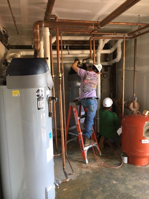 jd denton repairing hot water system