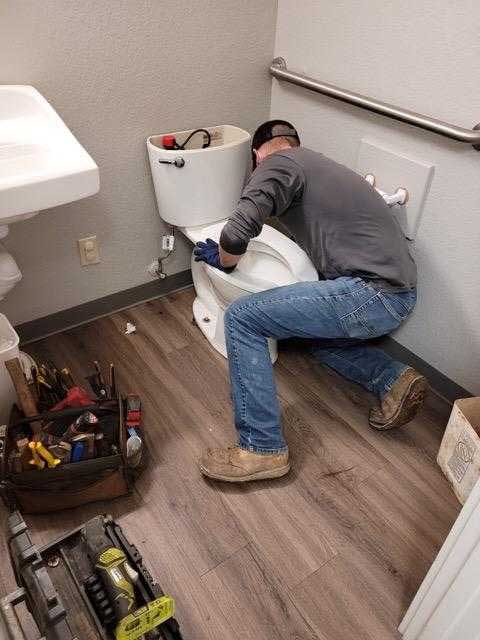 JD-Denton-working-on-commercial-restroom-in-camden-arkansas