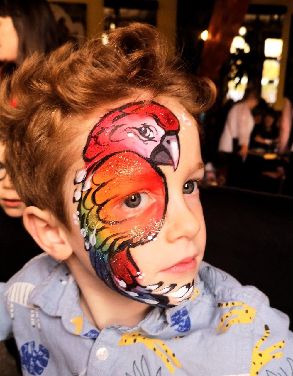 Parrott face painting. Birthday party 