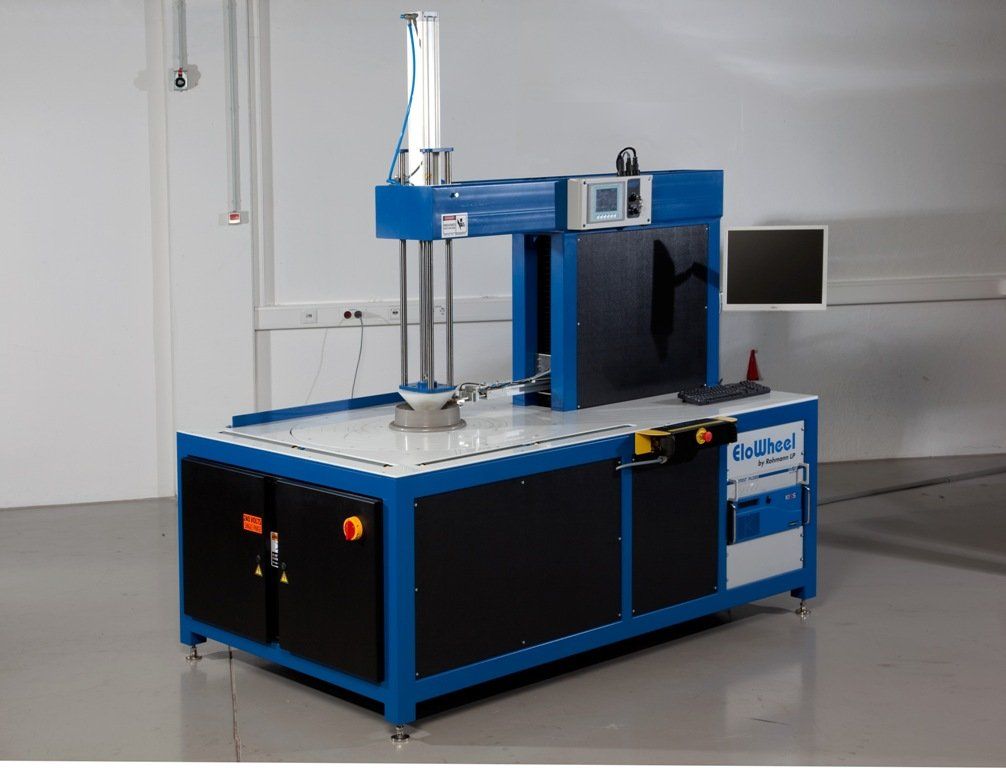 A blue and black machine with the word dell on it