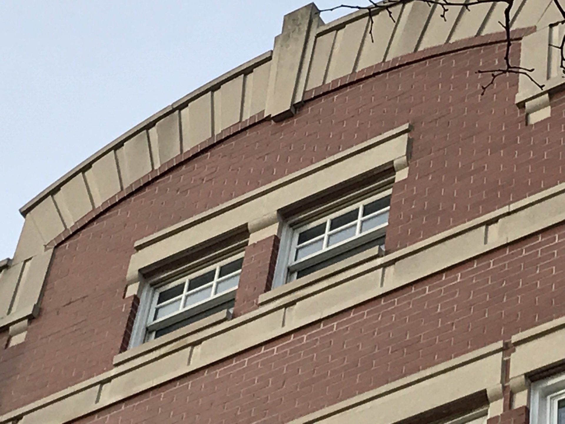 Renaissance Stone cornice and around windows is an entry point for water. WickRight parapet vents release trapped moisture.